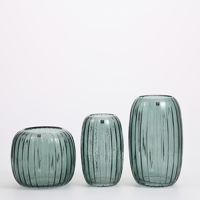 Heavy duty hand-blown vertical strip floral hot sale design size and color customized glass flower vase Chinese manufacture