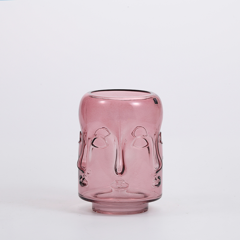 Heavy duty high fashion human face with Heart shape design artistic glass flower vase Chinese manufacture