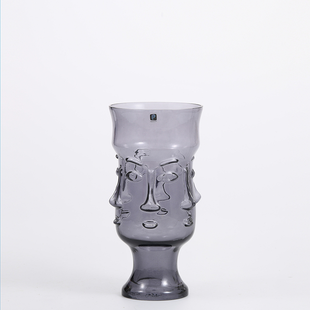 Heavy duty high fashion human face with Heart shape design artistic glass flower vase Chinese manufacture